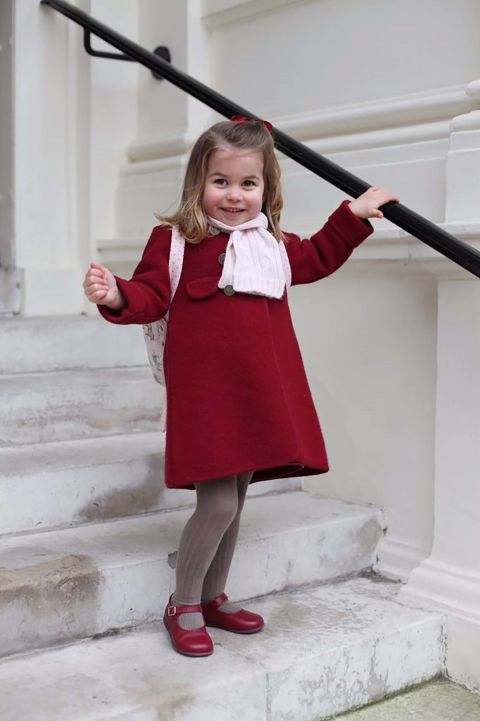 Charlotte smiles in a handout picture provided by the Duke and Duchess of Cambridge as she prepares for her first day at nursery school in January 2018.