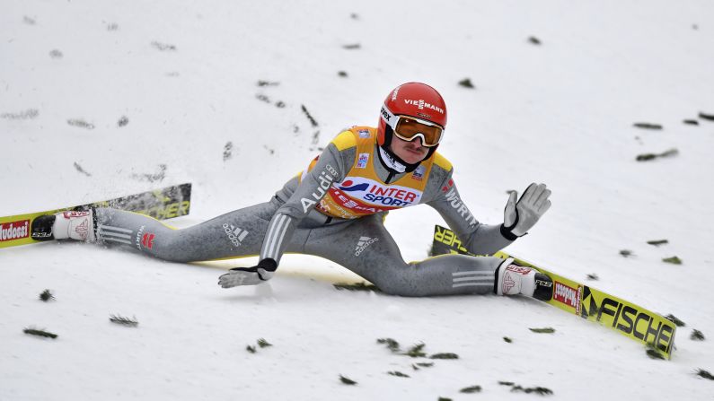 German ski jumper Richard Freitag falls Thursday, January 4, during the Four Hills Tournament in Innsbruck, Austria. He injured his hip and couldn't continue.