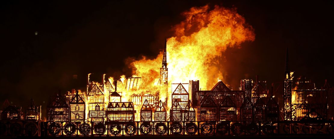 Prio to the Great Fire London, the capital was a jumbled low-rise city. Pictured: A replica of 17th-century London on a barge on the Thames  is set alight at an event to mark the 350th anniversary of the fire. 