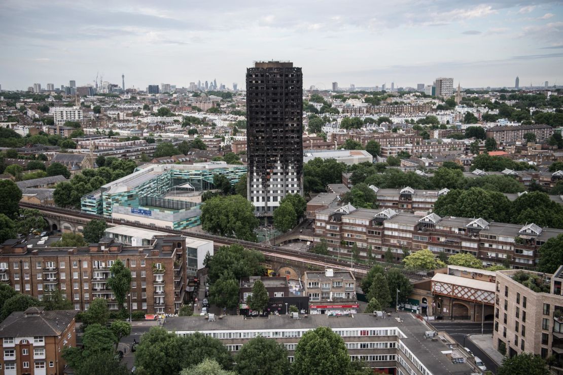 The remains of Grenfell Tower are seen from a neighbouring tower block on June 26, 2017 in London.