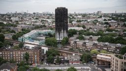 LONDON, ENGLAND - JUNE 26:  The remains of Grenfell Tower are seen from a neighbouring tower block on June 26, 2017 in London, England. 79 people have been confirmed dead and dozens still missing after the 24 storey residential Grenfell Tower block was engulfed in flames in the early hours of June 14, 2017.  (Photo by Carl Court/Getty Images)
