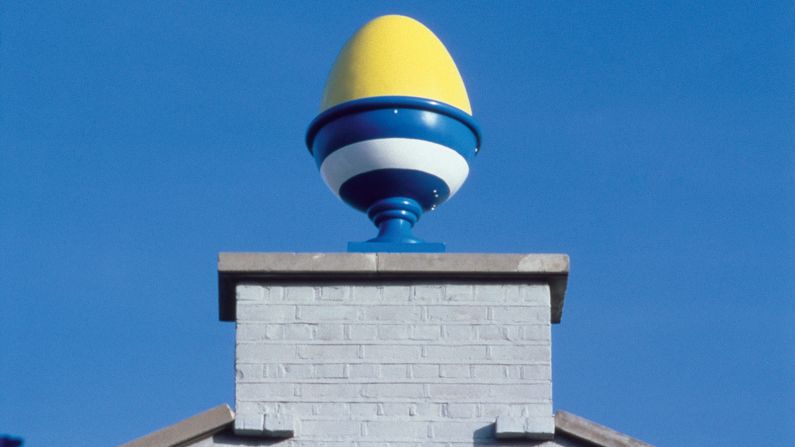 The egg cups that perch on the roof of this building tell  passersby that a breakfast TV show is filmed here.
