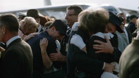 The USS Pueblo crew greet relatives upon returning from captivity in North Korea.