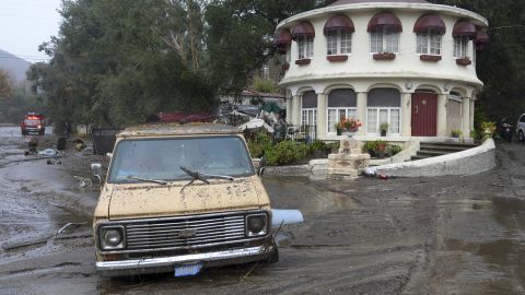 A van is stuck in the mud in the Sun Valley neighborhood of Los Angeles on January 9, 2018.