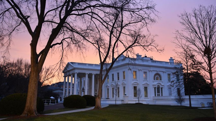 WASHINGTON, DC - JANUARY 20:  Dawn breaks behind the White House as the nation prepares for the inauguration of President-elect Donald Trump on January 20, 2017 in Washington, D.C.  Trump becomes the 45th President of the United States.    (Photo by Kevin Dietsch-Pool/GettyImages)