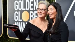 BEVERLY HILLS, CA - JANUARY 07:  Actor Meryl Streep (L) and NDWA Director Ai-jen Poo attend The 75th Annual Golden Globe Awards at The Beverly Hilton Hotel on January 7, 2018 in Beverly Hills, California.  (Photo by Frazer Harrison/Getty Images)