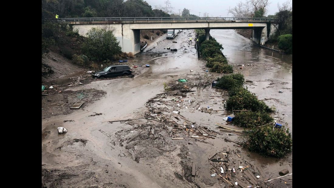 Runoff water from a creek floods Highway 101 in Montecito on January 9, 2018. Flooding forced many heavily traveled roads to close.