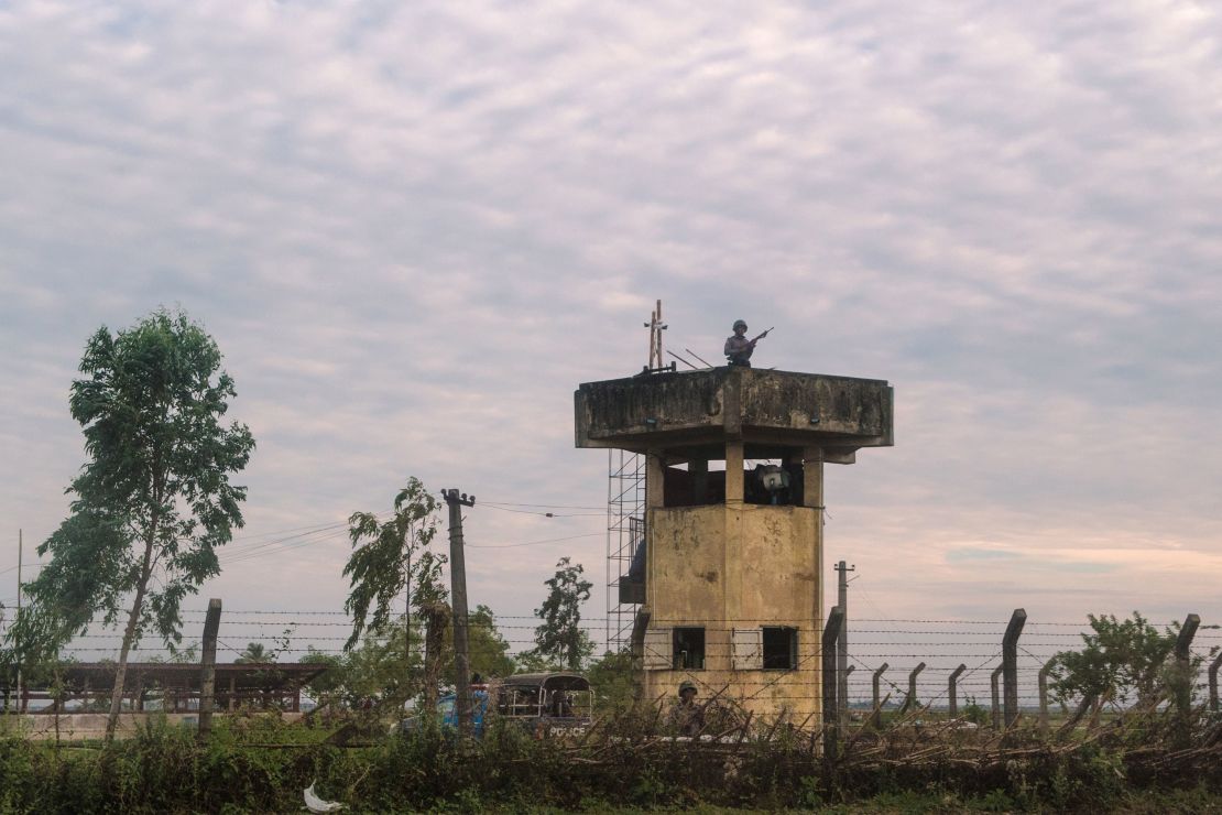In this photograph taken on November 12, 2017, border guards keep watch near a border post in Rakhine state in Myanmar.