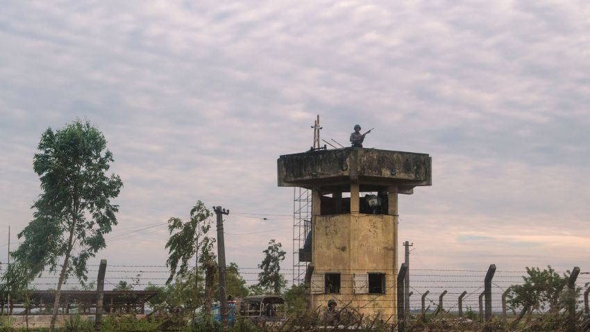 In this photograph taken on November 12, 2017, border guards keep watch near a border post in Rakhine state in Myanmar.
Torched villages and unharvested paddy fields stretch to the horizon in Myanmar's violence-gutted Rakhine state, where a dwindling number of Muslim Rohingya remain trapped in limbo after a violent military crackdown coursed through the region. A rare military-organised trip for foreign media by helicopter to Maungdaw -- the epicentre of a crisis that exploded in late August -- showed a landscape devoid of people, with blackened patches marking the spots where Rohingya villages once stood. 
 / AFP PHOTO / Phyo Hein KYAW / TO GO WITH Myanmar-Bangladesh-refugee-unrest-economy-agriculture, SCENE by Hla-Hla HTAY        (Photo credit should read PHYO HEIN KYAW/AFP/Getty Images)