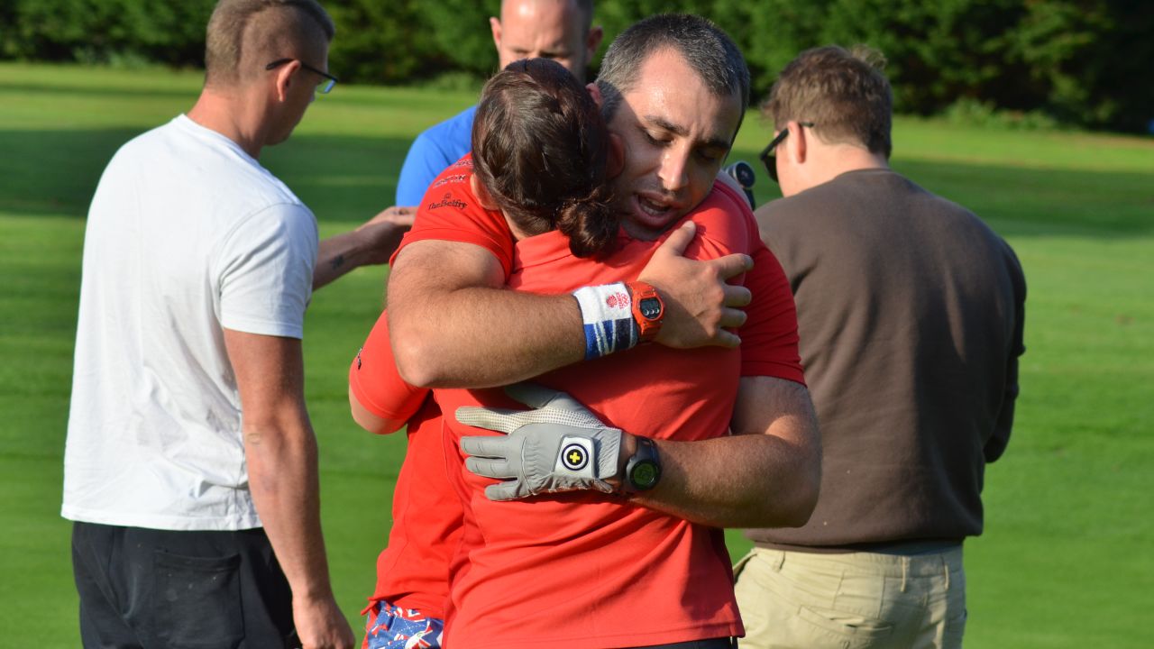 Jeffs and his wife Kelly savor the record-breaking moment at Tiverton Golf Club