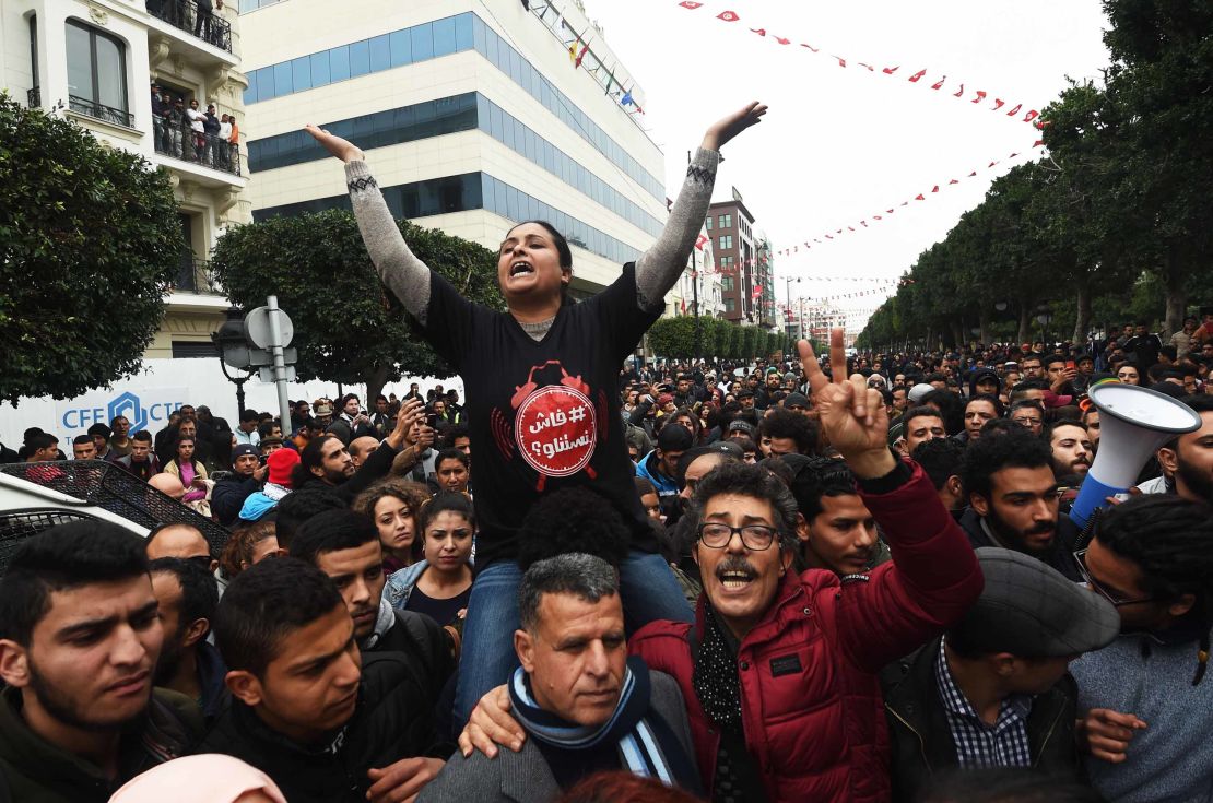 Tunisians shout slogans during an anti-austerity demonstration in Tunis on Tuesday.