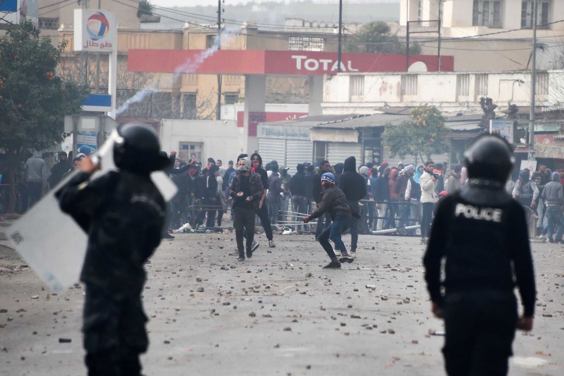 Tunisian protesters clash with security forces in the town of Tebourba on Tuesday.