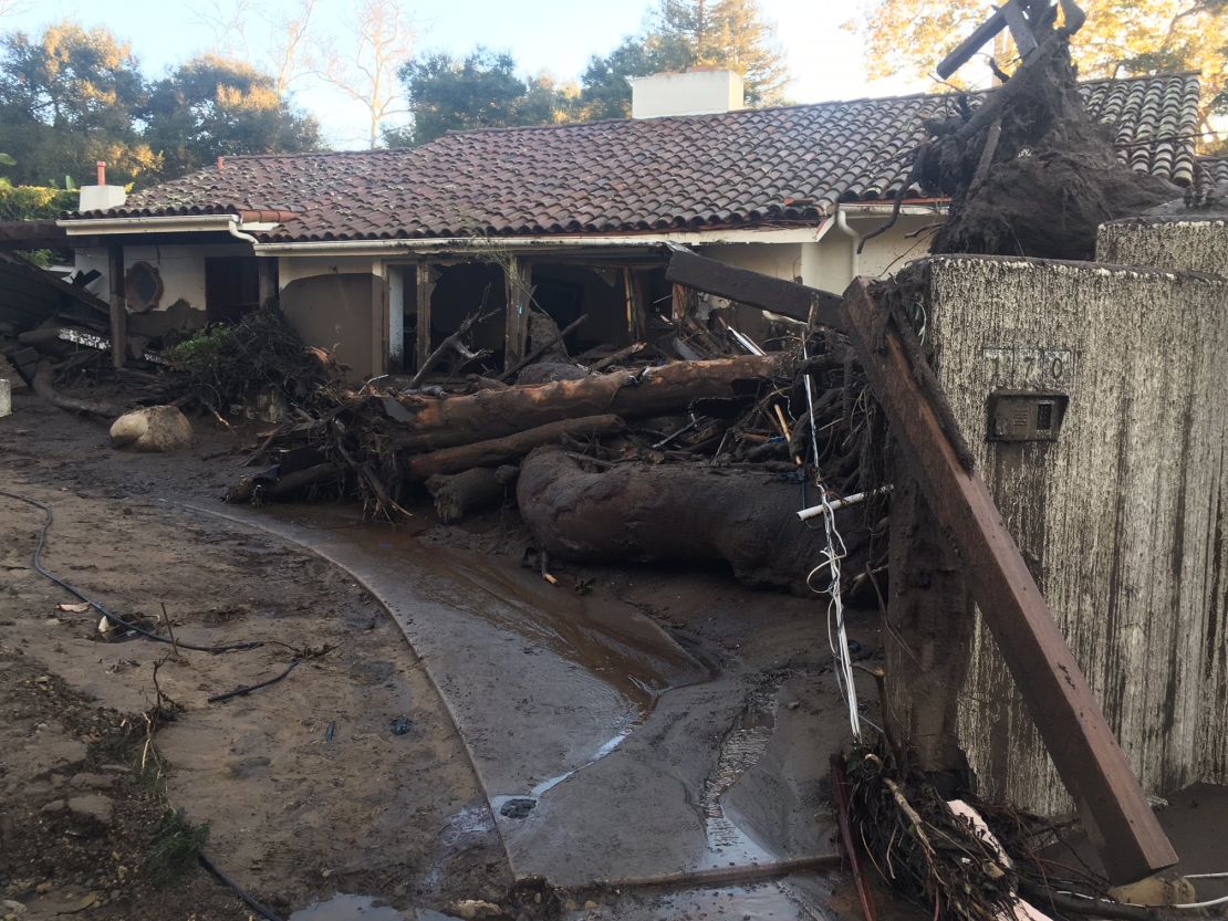 Debris surrounds a house Wednesday in Montecito, California.