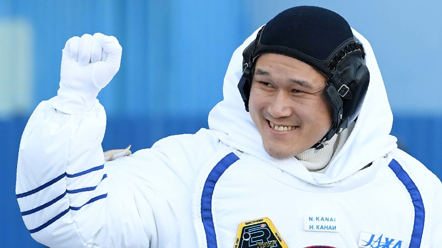 Japanese astronaut Norishige Kanai waves during a send-off ceremony ahead of his deployment to the International Space Station in December.