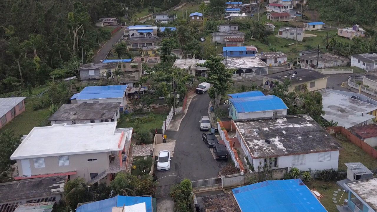 US Army Corps of Engineers contractors install temporary tarps -- or "Blue Roofs" -- after natural disasters.