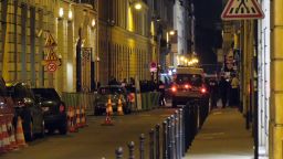 Police congregate outside the Ritz Hotel in Paris after the robbery Wednesday.