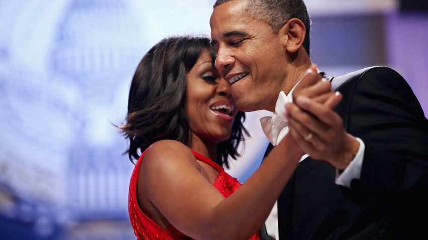 WASHINGTON, DC - JANUARY 21:  U.S. President Barack Obama and first lady Michelle Obama sing together as they dance during the Inaugural Ball at the Walter Washington Convention Center January 21, 2013 in Washington, DC. Obama was sworn-in for his second term of office earlier in the day.  (Photo by Chip Somodevilla/Getty Images)