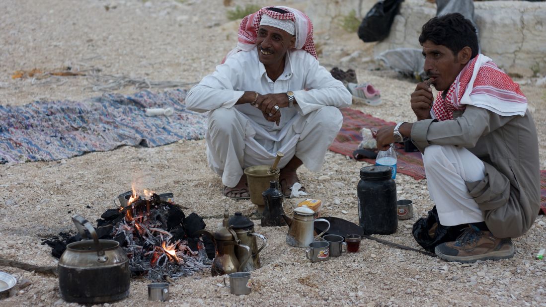 <strong>Teatime with Tarabin:</strong> Sharing tea and coffee is an important part of Bedouin hospitality, and each day on the trail begins and ends with hot drinks around the fire. Coffee is ground by hand in a mortar and pestle and infused with aromatic cardamom. Tea comes with an energetic dose of sugar. 