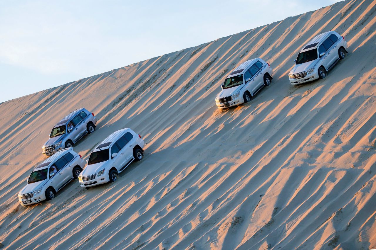 <strong>Rush hour: </strong>Dune bashing in the desert is a popular pastime in Qatar, but inexperienced drivers risk getting stuck or lost.