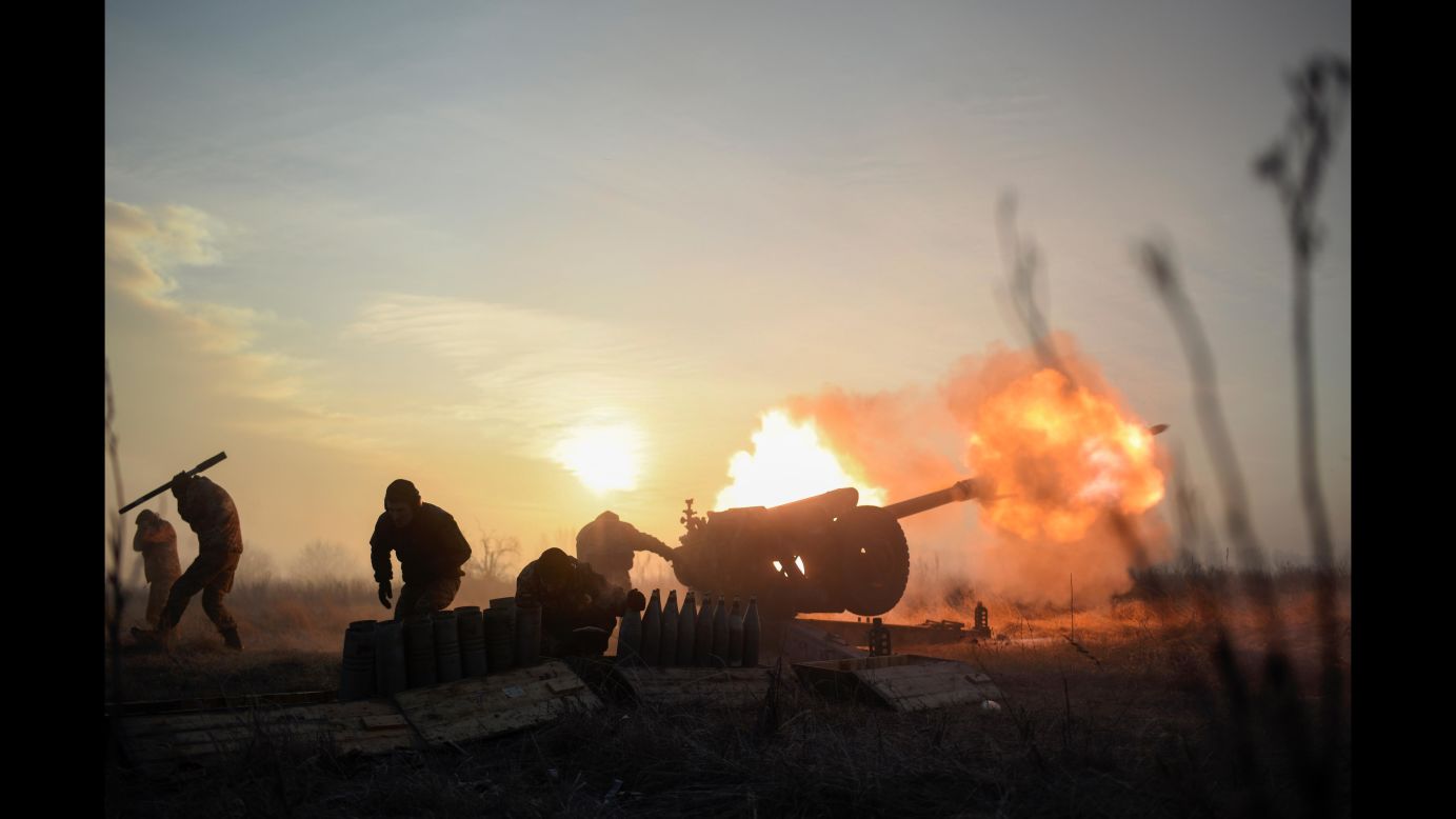 Ukrainian servicemen fire a howitzer at pro-Russian separatists near the Ukrainian village of Novoluhanske on Thursday, January 11.