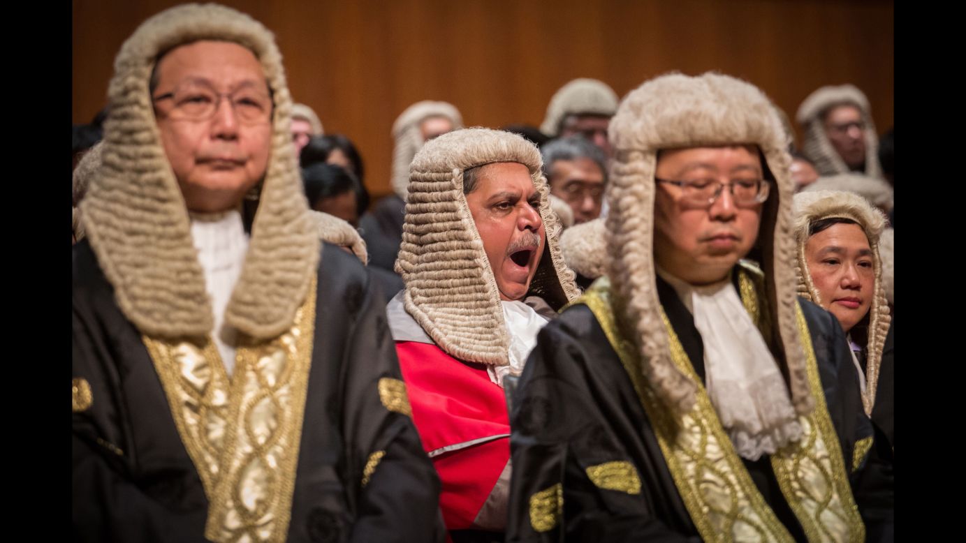 A judge yawns during a ceremony held to mark the opening of the legal year in Hong Kong on Monday, January 8.