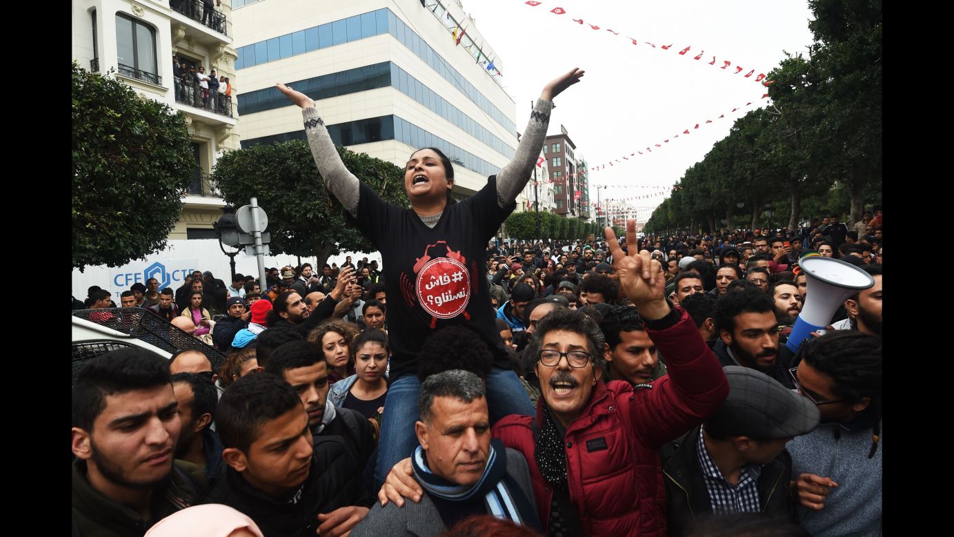People shout slogans during an anti-austerity protest in Tunis, Tunisia, on Tuesday, January 9. Tunisian police <a href="http://www.cnn.com/2018/01/11/africa/tunisia-protests-arrests-intl/index.html" target="_blank">have arrested more than 300 people</a> after four nights of protests, Interior Ministry spokesman Col. Major Khelifa Chibani told state news agency TAP on Thursday, January 11. The protests are against an unpopular new Finance Act, which saw price hikes and value-added-tax increases imposed from January 1.