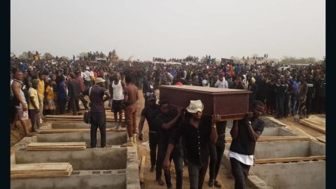 Men carrying coffin during the mass burial in Makurdi, Benue on Thursday