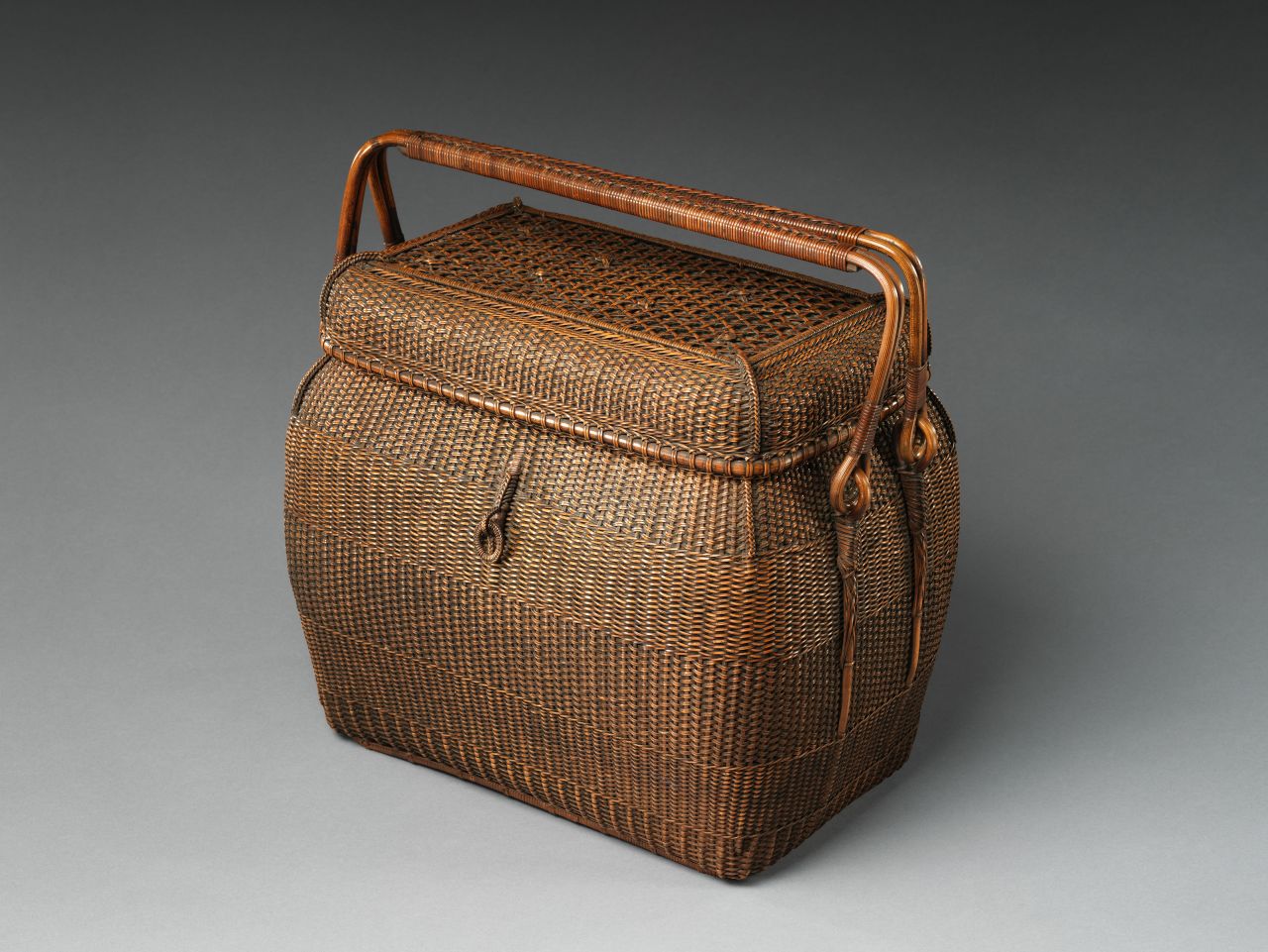 A basket dating back to the latter half of the 19th century, a time when bamboo weaving was beginning to be seen as an art in its own right.