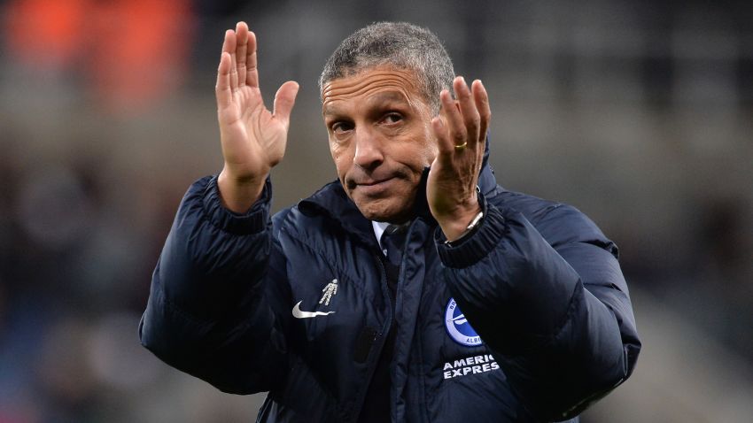 NEWCASTLE UPON TYNE, ENGLAND - DECEMBER 30:  Chris Hughton, Manager of Brighton and Hove Albion applauds fans after the Premier League match between Newcastle United and Brighton and Hove Albion at St. James' Park on December 30, 2017 in Newcastle upon Tyne, England.  (Photo by Mark Runnacles/Getty Images)