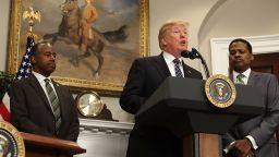 U.S. President Donald Trump speaks while flanked by HUD Secretary Dr. Ben Carson (L) and Isaac Newton Farris, Jr., before signing a proclamation to honor Martin Luther King, Jr. day, in the Roosevelt Room at the White House, on January 12, 2018 in Washington, DC. Monday January 16 is a federal holiday to honor Dr. King and his legacy.  (Photo by Mark Wilson/Getty Images)