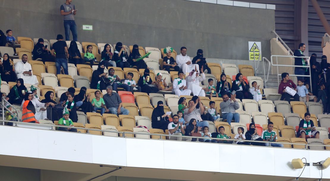 Female Saudi supporters of Al-Ahli attend their teams football match against Al-Batin in the Saudi Pro League at the King Abdullah Sports City in Jeddah on January 12, 2018.
