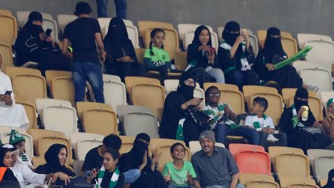 Female Saudi supporters of Al-Ahli attend their teams football match against Al-Batin in the Saudi Pro League at the King Abdullah Sports City in Jeddah on January 12, 2018.