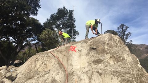 Crews working to break down boulders on January 14, 2018, in Montecito, California. 
