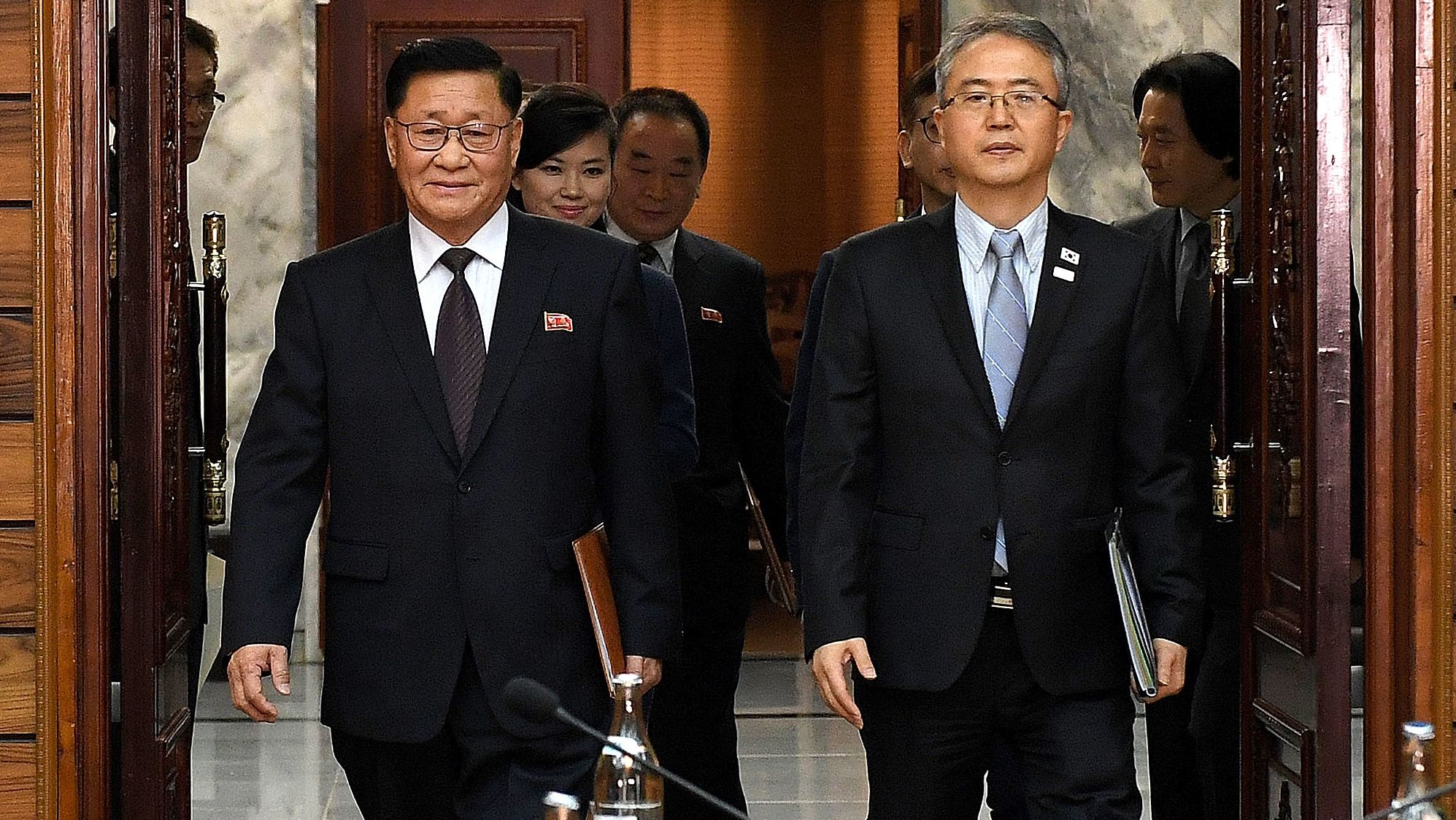 Moranbong member Hyon Song Wol seen with North and South Korean officials on January 15, 2018.