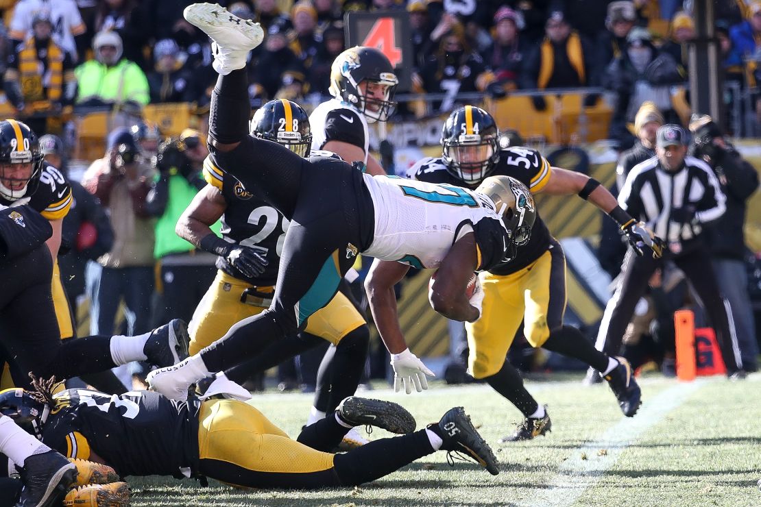 Leonard Fournette #27 of the Jacksonville Jaguars dives into the end zone for a touchdown.