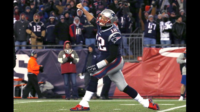 New England Patriots quarterback Tom Brady celebrates after a touchdown in the third quarter of the AFC divisional playoff game against the Tennessee Titans on Saturday, January 13, in Massachusetts. The Patriots will go on to face the Jacksonville Jaguars to vie for a spot in the Super Bowl.