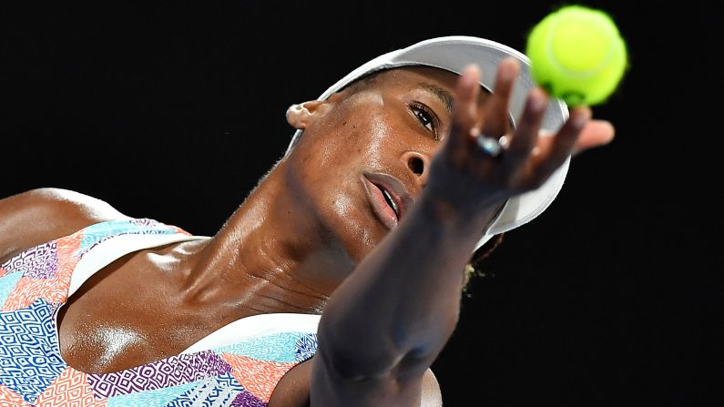 Venus Williams serves against Switzerland's Belinda Bencic during their women's singles first-round match on day one of the Australian Open in Melbourne on January 15. Bencic defeated Williams in a surprising upset. <br />