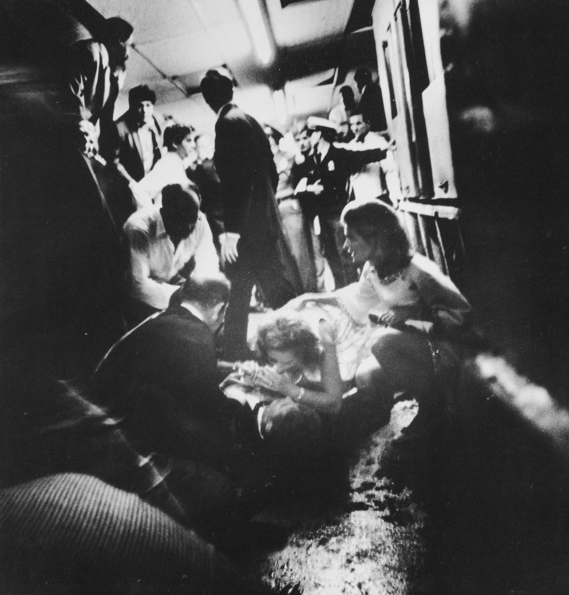 Robert F. Kennedy lies wounded on the floor of the Ambassador Hotel's kitchen while his wife Ethel leans over him on June 5, 1968, in Los Angeles.