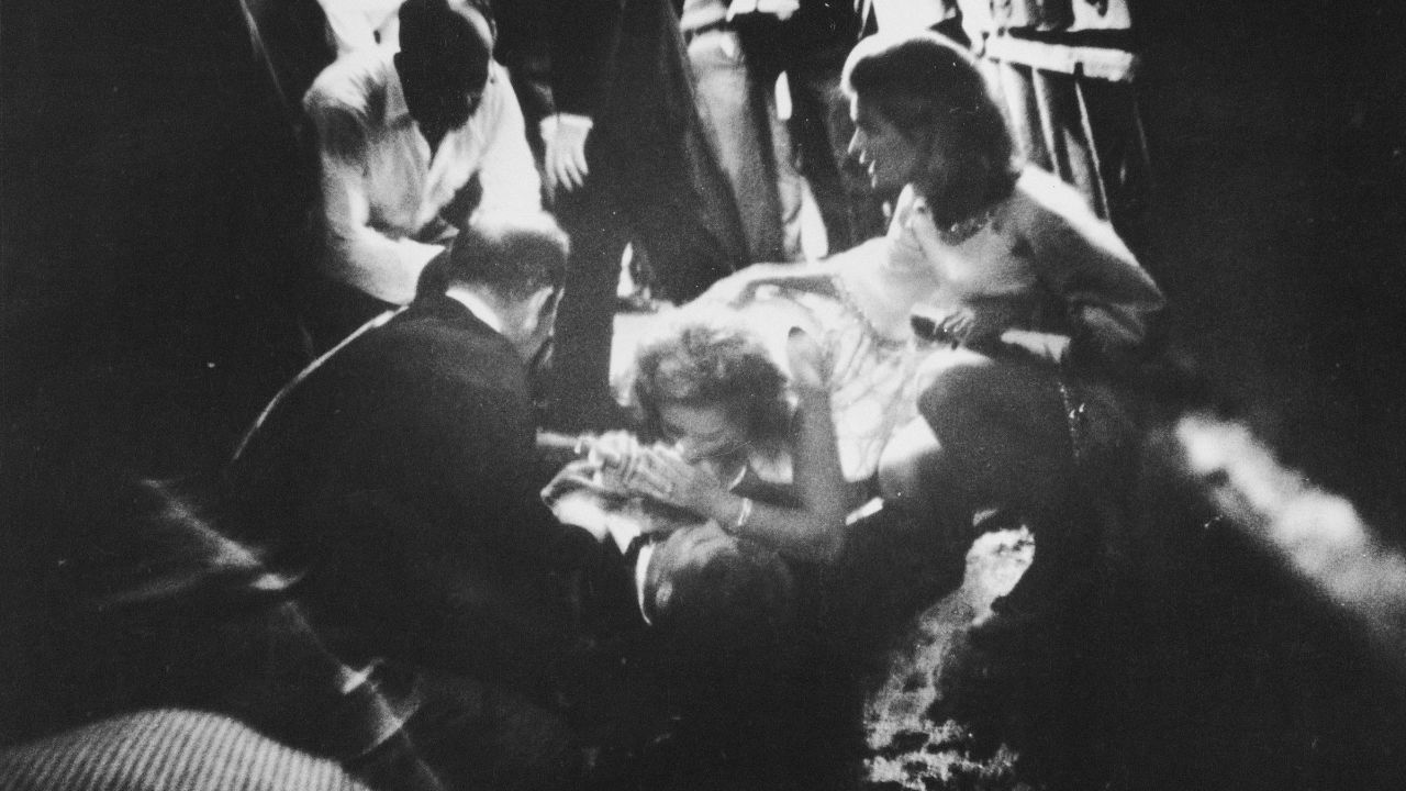 Robert F. Kennedy lies wounded on the floor of the Ambassador Hotel's kitchen while his wife Ethel leans over him on June 5, 1968, in Los Angeles.