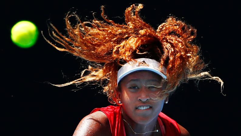 Naomi Osaka of Japan watches the ball as she serves during a practice session ahead of the 2018 Australian on Thursday, January 11.<br />