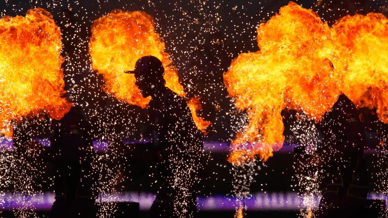 Hobart Hurricanes players run out onto the pitch before the Big Bash League match against the Brisbane Heat on Monday, January 15.