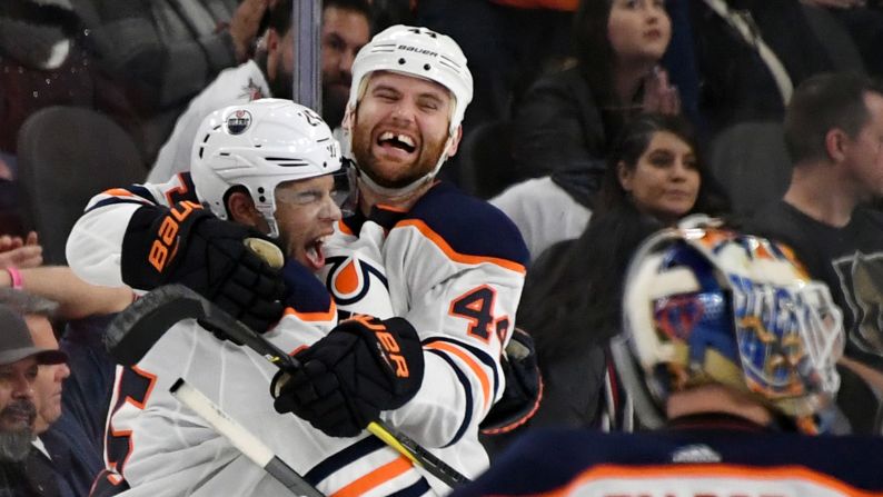 Darnell Nurse, and Zack Kassian, No. 44, of the Edmonton Oilers celebrate after Nurse scored an overtime goal against the Vegas Golden Knights to win their game 3-2 on Saturday, January 13, in Las Vegas.<br />