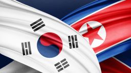Photo illustration of North Korea and South Korea flags.