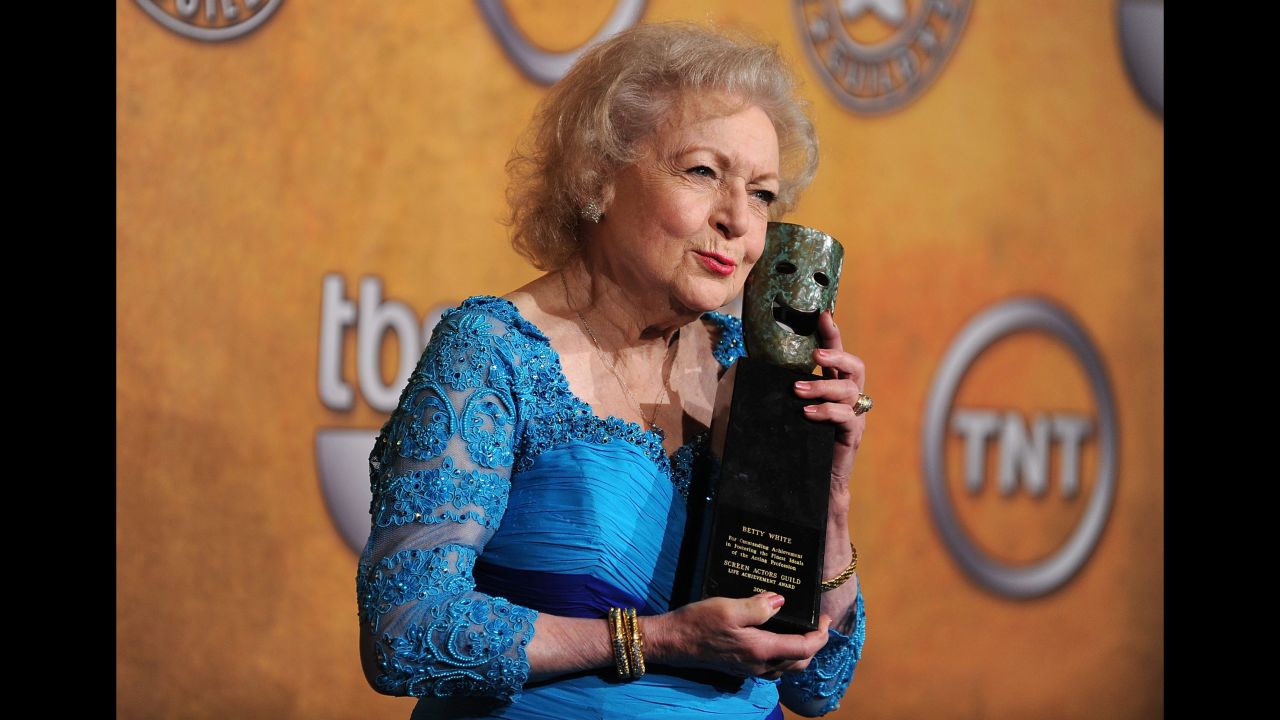 White clutches her Life Achievement Award at the Screen Actors Guild Awards in 2010. "I am the luckiest old broad on two feet," <a href="http://www.cnn.com/2017/02/09/entertainment/betty-white-brooke-baldwin-history-of-comedy-cnntv/index.html">she told CNN's Brooke Baldwin in 2017.</a> "I'm still able to get a job, at this age. I will go to my grave saying, 'Can I come in and read for that tomorrow?' "