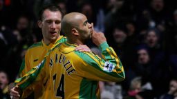 NORWICH, UNITED KINGDOM:  Norwich City's Dean Ashton (L) looks on as Leon McKenzie (R) gestures to the crowd after scoring a goal against Chelsea during Premiership football Carrow Road in Norwich, United Kingdom, 05 March 2005. Chelsea beat Norwich City 3-1.   AFP PHOTO/JIM WATSON    (No telcos,website uses to description of licence with FAPL on www.faplwb.com) ...  (Photo credit should read JIM WATSON/AFP/Getty Images)