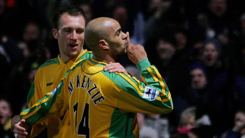 NORWICH, UNITED KINGDOM:  Norwich City's Dean Ashton (L) looks on as Leon McKenzie (R) gestures to the crowd after scoring a goal against Chelsea during Premiership football Carrow Road in Norwich, United Kingdom, 05 March 2005. Chelsea beat Norwich City 3-1.   AFP PHOTO/JIM WATSON    (No telcos,website uses to description of licence with FAPL on www.faplwb.com) ...  (Photo credit should read JIM WATSON/AFP/Getty Images)