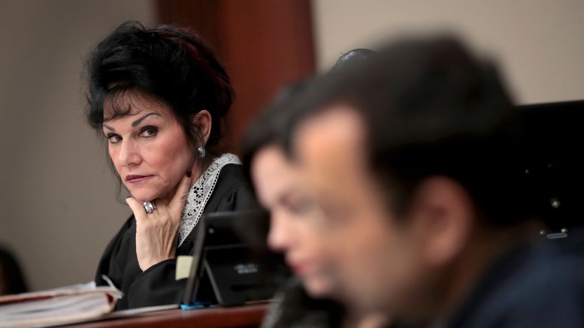 Judge Rosemarie Aquilina (L) looks at Larry Nassar (R) as he listens to a victim's impact statement by Jennifer Rood Bedford prior to being sentenced after being accused of molesting about 100 girls while he was a physician for USA Gymnastics and Michigan State University, where he had his sports-medicine practice on January 16, 2018 in Lansing, Michigan.