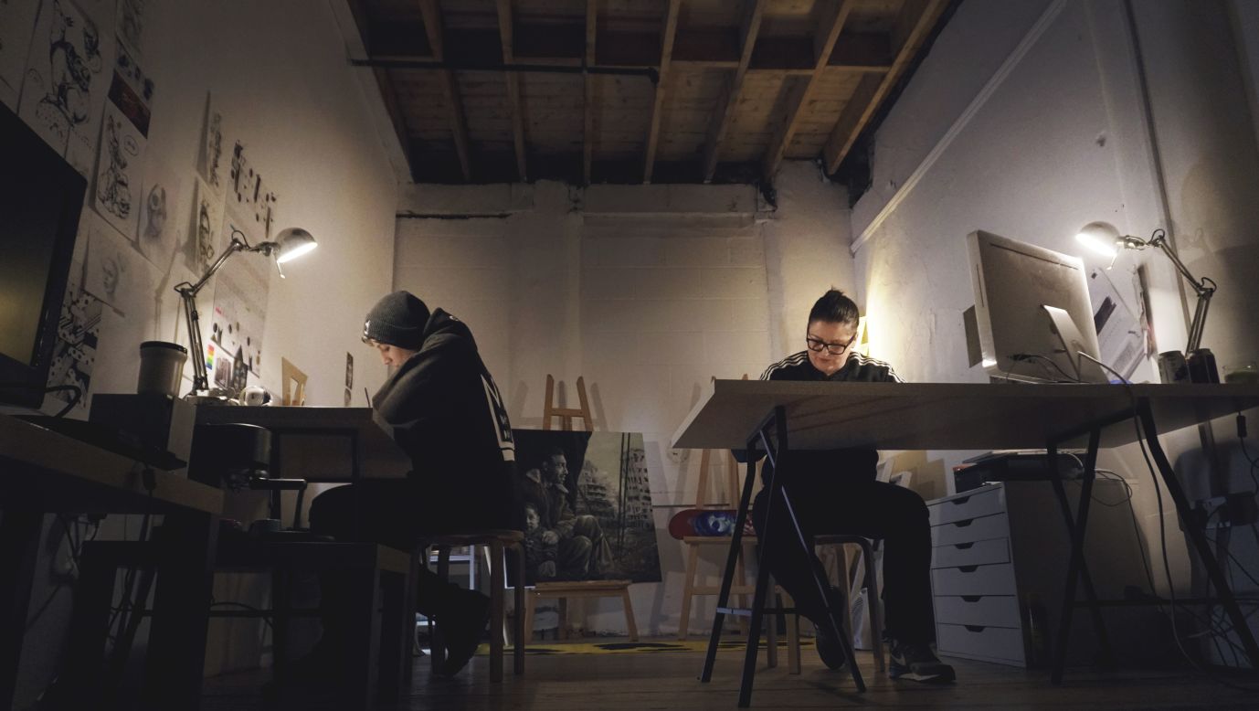 Nomad Clan at work in their studio. "The most intense part [of the work] is getting the sketch down and getting the sketch right, because that's the framework that you build from," says Arlo.