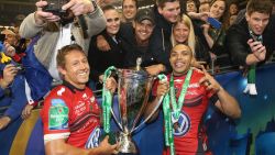 Jonny Wilkinson (left) celebrates winning the Heineken Cup with Bryan Habana and a number of Toulon fans in 2014.