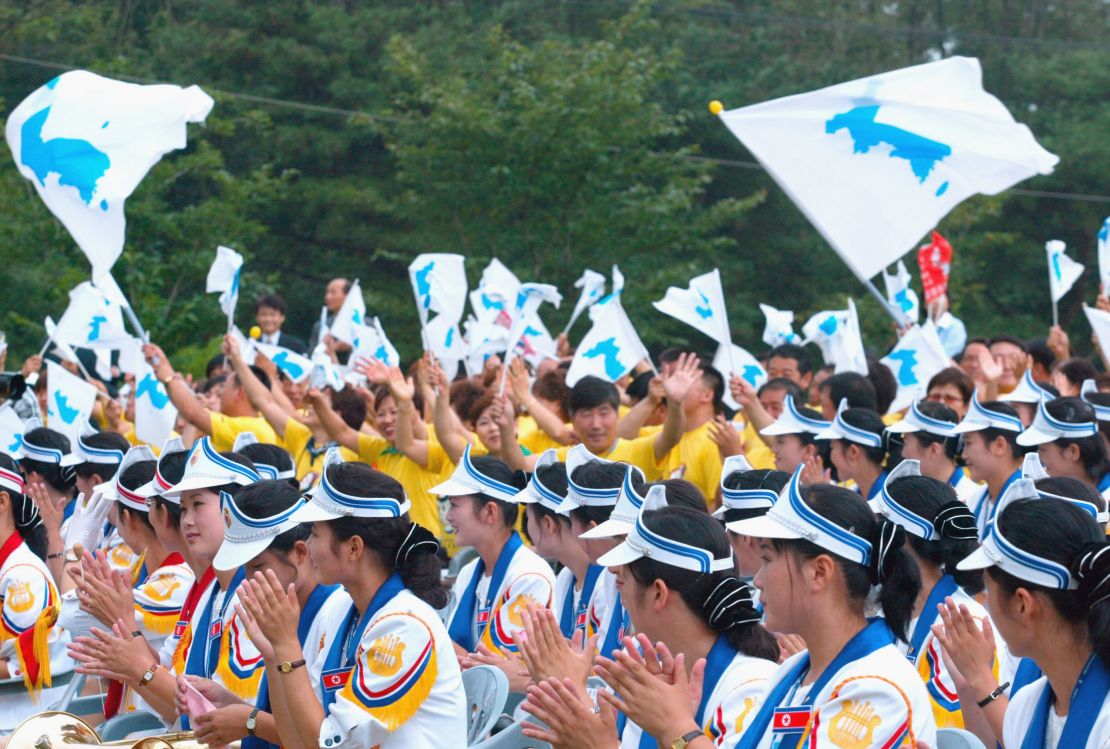 South Korean supporters wave unified flags at the World Student Games in August 2003 in Daegu, South Korea.